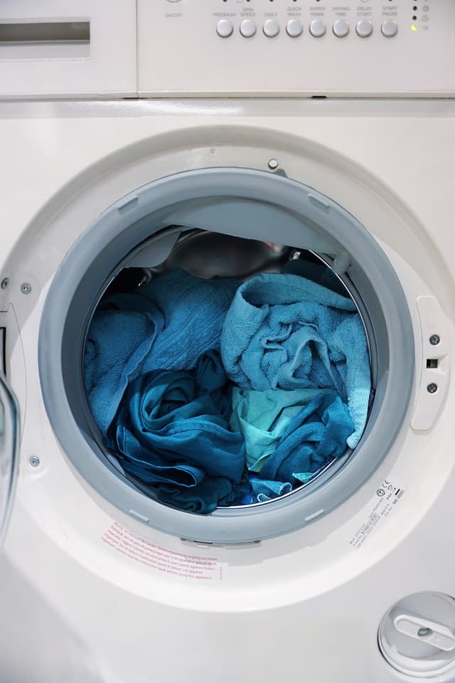 Washing machine with clothes inside